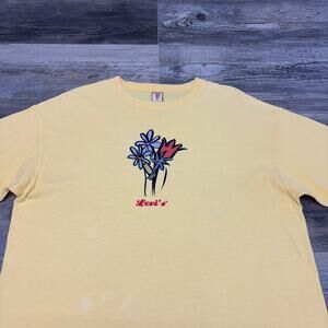 Vintage 90s Levis Jeans for Women Yellow Large Center Flower Graphic T-Shirt USA